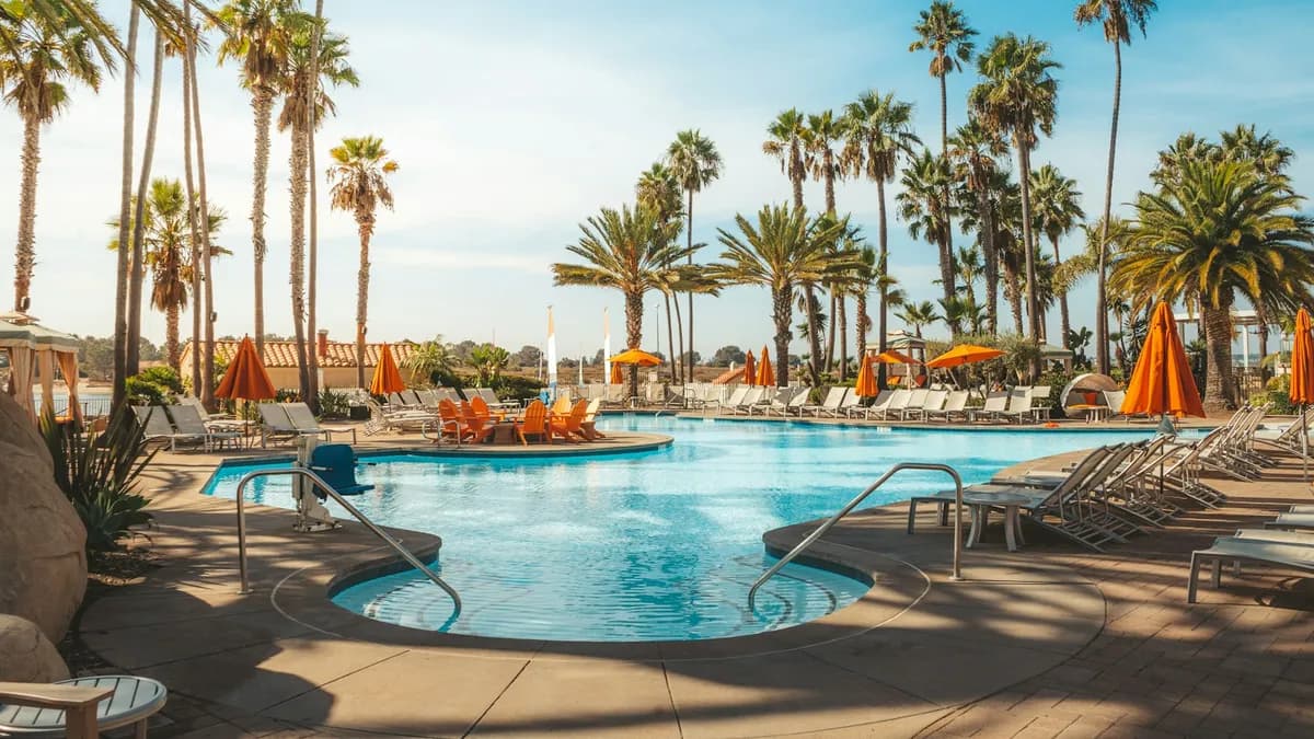 Hotel Room Block vs Booking Page for Destination Weddings: What Each Does, and Why Planners Use Both